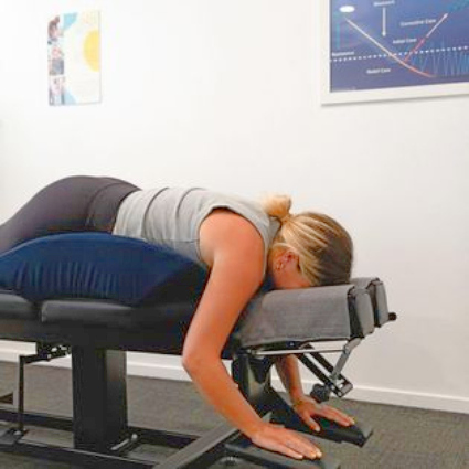 Woman on adjusting table